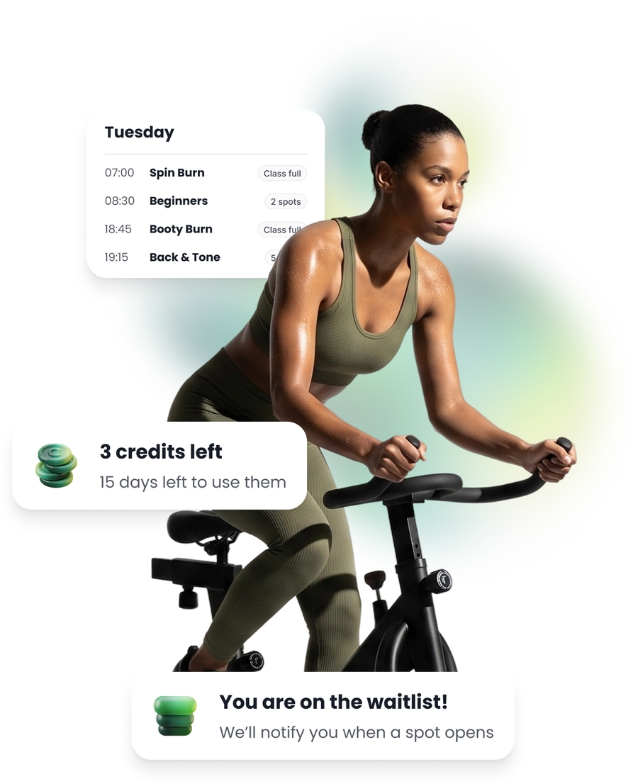 A rider on a spin bike, with a day of classes beside her, the credits left on her pack and the days they last, and a place on the waiting list for a class that is full.