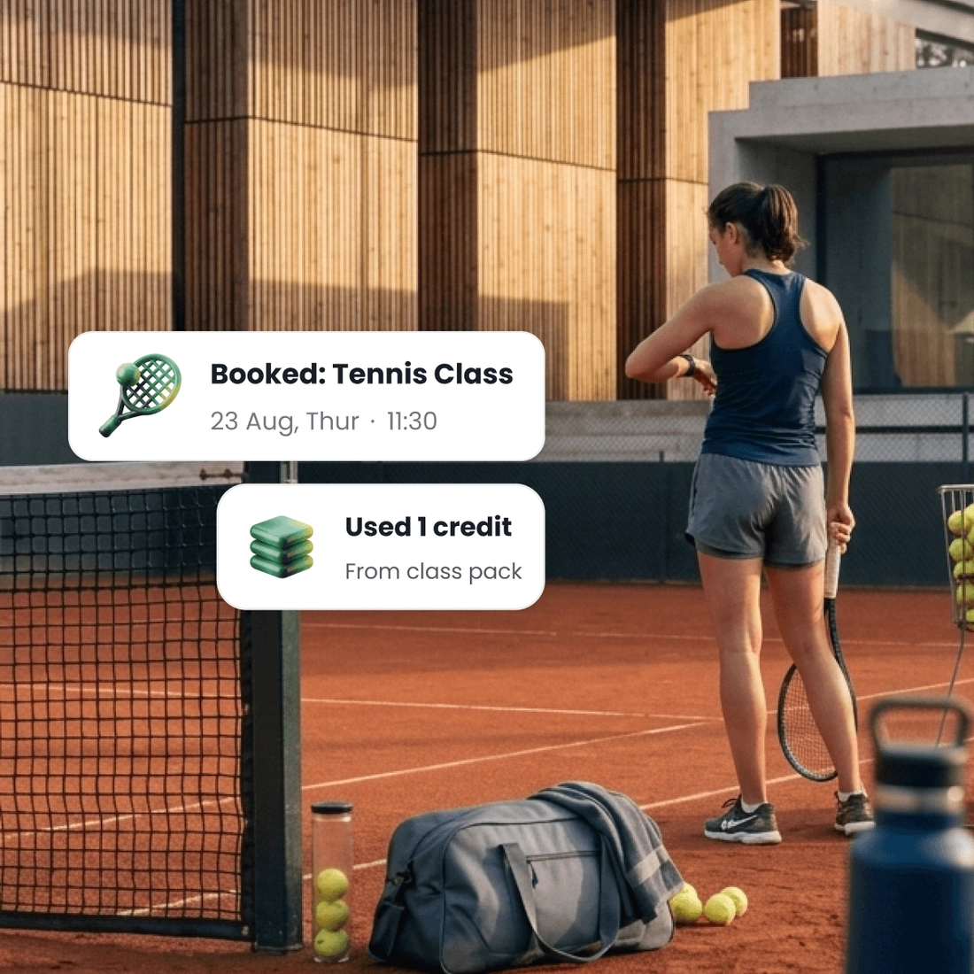 A player at the net with a bag of balls at her feet, beside the class she just booked and the credit it took off her block.