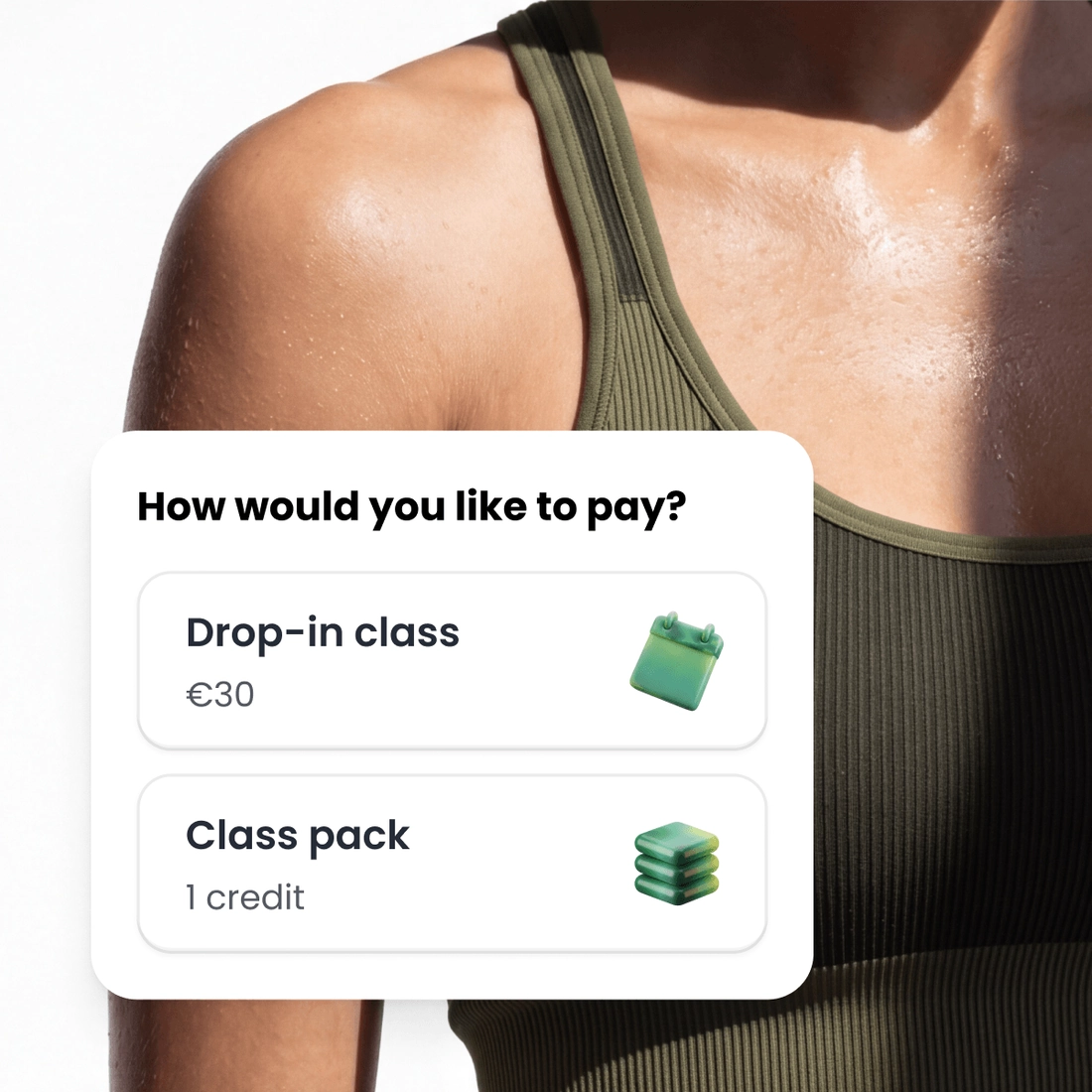 A woman at the end of a class, beside the checkout asking how she would like to pay, as a drop-in with a price on it or with a credit from her pack.