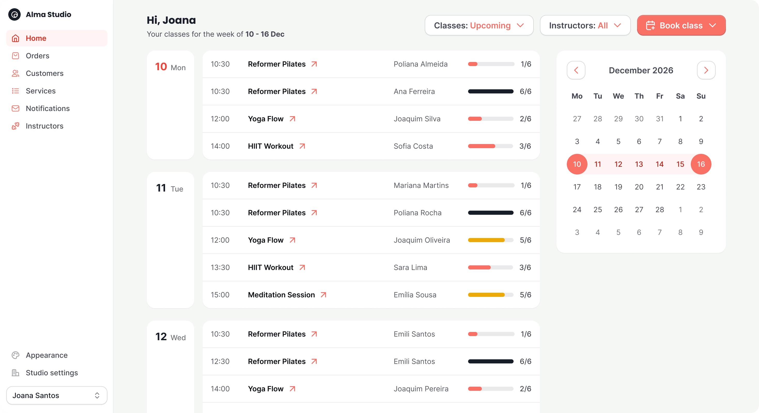 The admin home screen: the week’s classes with instructors and spots taken, beside a month calendar.